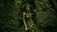 Placeholder: woman in a dress made of tiny leaves, growing out of a tree in a wood