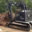 Placeholder: I am starting an equipment/skid steer land clearing/mulching company and need a logo for business cards, ball caps/hats, Shirts, ect… I need the logo to look clean/appropriate for an equipment/outdoor company. I would like to have some type of (Tracked Skid Steer with mulching head attachment attached on Machine) design in logo as well.