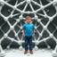 Placeholder: a 3d structure fractal based on tiangles with small spheres at joints ,with a 8 years old boy standing in center