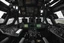 Placeholder: Black rabbit in the pilot seat of a rabbit mecha. Photograph.