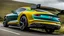 Placeholder: Bentley Mustang 2023 on road rear view