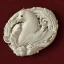 Placeholder: ivory brooch of a kingfisher, decorative design, classical ornament, highly ornate, highly intricate, highly detailed etching, marble carving, warm lighting, linen backdrop