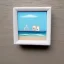 Placeholder: tiny oil painting of tiny seaside village, plain white background, solid white background, tiny white canvas, tiny white frame, plain white wall, melancholy, tender, moody, vintage, delicate arrangement, beautiful composition, etsy, aesthetic layout, plain solid white background