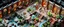 Placeholder: bitmap isometric big map of space ship invasion museum and dinosaur skeletons with different rooms fountains and canals and jungle train with plants and animals with transparent refractive glass monsters and balls from marble madness and from d and d, 2 levels with stairs and pillars, realistic 3d, in style of escher and giger