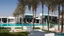 Placeholder: Description of a modern Emirati style villa: Located on a magnificent piece of land in the heart of the Emirates, our villa embodies the finesse of design and detailing that promises a luxurious residential experience. This two-story villa, with its elegant and contemporary spaces, stands out. The exterior walls of the villa are made of black and white stones, adding an elegant and luxurious touch to the design.Pictures of the villa from four sides