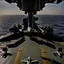 Placeholder: View from the bridge of an aircraft carrier.