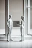 Placeholder: Two of Maniquí de pintura Artist mader made of all are in a white texture standing alone by the window holding hands