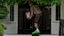 Placeholder: UPS delivery man in green crocs is at the gate