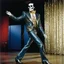 Placeholder: [high res colour photo by helmut newton] this dancing skeleton wears the incredible sequined jacket that Elvis wore during a concert in Detroit