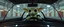 Placeholder: car driving happy 2d anime fluffy slimy slug alien sloth gremlin woman in the style of Escher and Giger and Fallout 4, pinhole cam, airbrush 3d rendering, on tv screen:A five-second cinematic single take in a clean industrial presentation hall.