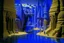 Placeholder: A purple cove with treasure designed in ancient Egyptian architecture and sculptures painted by Grant Wood