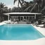 Placeholder: a pool party at Jeffrey Epstein's Island by Charles Bukowski