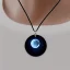 Placeholder: necklace with a simple, elegant design featuring a single, shimmering polyester in moon pendant