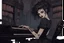 Placeholder: scarred cyberpunk vampire girl with tribal tattoos short curly cyberpunk hair playing a grand piano in the library of a decaying gothic mansion in candlelight at midnight