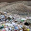 Placeholder: A photo of a landfill or waste disposal site to represent the issue of non-recyclable filters.