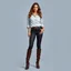 Placeholder: A full-body shot of a beautiful lady wearing shirt and tight pant with long boots ,curvy hair