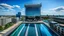 Placeholder: A stunning, state-of-the-art architectural masterpiece featuring a modern, futuristic glass and steel building with multiple levels. The building stands out with a sleek, minimalist design, and boasts a rooftop pool with a stunning view of the city. The skyline in the background is filled with towering skyscrapers, reflecting the city's vibrant energy. The overall atmosphere of the image is crisp, clean, and futuristic.