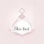 Placeholder: Create a logo with the name Deniz Boutique, inspired by diamond dresses, with the symbol of the dress, baby pink