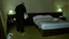 Placeholder: man urinates on the floor in his hotel room