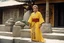 Placeholder: [very impressive high res masterpiece in Kodak Eastman 5247, bokeh scene by Stanley Kubrick] Elizabeth Montgomery Shaolin gangsta monk covered by tattoos waiting outside in yellow kimono, on a stone doorstep, she menaces the camera with her finger