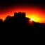 Placeholder: Silhouette of the Czech castle "Trosky" at sunset.