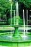 Placeholder: Green area and water fountain