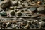 Placeholder: A top down flat lay of quarry tools spread out neatly on a table, captured in a photo that screams simplicity. Include an assortment of rocks, and stones. Include golf tools.