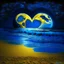 Placeholder: electric heart blue and gold moon on the beach