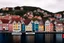 Placeholder: Colored pencil drawing, Very detailed, Realistic, Drawing of the colorfull houses in the city Bergen in Norway. Colorfull, professional, realistic, detailed, ultra HD