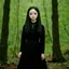 Placeholder: Devon aoki as Wednesday addams, in the woods
