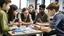 Placeholder: The image depicts a group of students actively engaged in a collective discussion within a classroom. The atmosphere is filled with enthusiasm and collaboration, evident through their lively interaction and exchange of ideas. The image illustrates the promotion of social interaction and cultural learning within an educational environment, where students learn from one another and build interactive bridges that contribute to enhancing understanding and cooperation among diverse cultures.