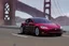 Placeholder: A Tesla 'Model Y' is drifting at high speeds, on the 'Golden Gate' bridge. (CINEMATIC, WIDE ANGLE LENS, PHOTO REAL)