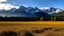 Placeholder: Alberta field with rocky mountains in the background