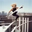 Placeholder: Sandra Dee in agent provocateur parkour athletes, jumping over a fence, jumping over a hedge, jumping onto a roof, aiding and abetting and jumping onto the roof of a building, and finally jumping from the roof of a building to the roof of a building far away, victory pose. Winter clothing.