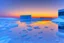 Placeholder: Sunset, winter, Futuristic buildings in the ice, tendency to science fiction, impressionism painting