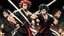 Placeholder: yujiro hanma vs yoriichi tsugukuni, baki vs kimetsu no yaiba, two mans standing in front of each other, a big strong man in black shirt with red hair and evil grin in martial art's stance with bare fists facing a smaller feminine swordsman with long hair and calm face reaching for his sword in traditional japanese clothes both preparing to fight each other