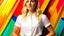 Placeholder: Caucasian female with blonde hair, around 30 years old, wearing a white top and a belt, standing in front of a colorful abstract background