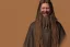 Placeholder: A laughing braided long haired bearded tall man wearing rugged long merchant's coat a cape and gold earrings and jewelry. medieval fantasy, black background