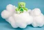 Placeholder: overstuffed white plushie stuffed toy clouds, a vintage good-luck-bear(care bear, Green) with tummy symbol(4 leaf clover) sitting on top of the cloud, blue background