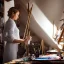 Placeholder: Close up of Beautiful female artist painting a self portrait in her attic studio, dramatic light, shadows