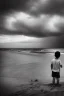 Placeholder: young boy on beach with a man laying down behind him, dark storm clouds overhead, gloomy, bleak, shopping trolley on side, dusk. the road cormac mccarthy