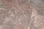 Placeholder: scratched garage floor, from very low perspective