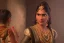 Placeholder: Maharashtrian woman looking in an old Peshwa antique mirror, misty, hyper-realistic, hyperdetailed, high-octane render, wide shot