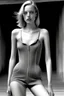 Placeholder: beautiful woman, anorexic, grey onepiece swimsuit, photorealistic, blond hair to chin, style: helmut newton