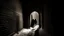Placeholder: A foreboding tunnel entrance carved into a weathered brick wall stands tall against the snowy landscape. People cautiously advance towards the entrance, their faces etched with anticipation. The scene is depicted in a hauntingly beautiful photograph, capturing the eerie atmosphere with stunning clarity. Shadows dance ominously on the aged bricks, creating a sense of mystery and unease. The image expertly balances tension and intrigue, drawing viewers into a world of chilling suspense.
