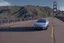 Placeholder: A Tesla 'Model Y' is drifting at high speeds, on the 'Golden Gate' bridge. (CINEMATIC, WIDE ANGLE LENS, PHOTO REAL)