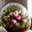 Placeholder: Cinematic shot of peonies inside a crystal lattice globe, glass, crystal, linen, dewdrops, warm lighting, luxurious, terrarium