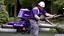 Placeholder: fedex driver with chainsaw