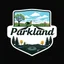 Placeholder: design for a shop that does oil changes, top has elements of beautiful park highway drive on flat land with elm and poplar trees, bottom shows the engine under car hood. on windshield is written "Parkland", all inside a shield shape with squared top and rounded bottom, in the style of national parks stickers