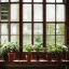 Placeholder:  mahogany table lush house plants in pots looking out of a window to a crowded city with many textbooks on the table